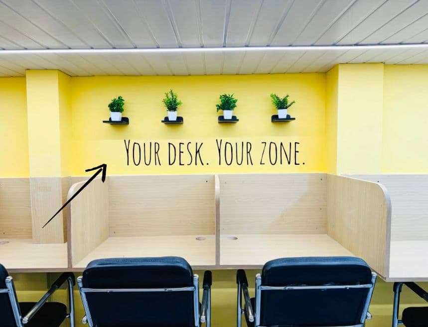 Individual study cubicles beneath the Your Desk Your Zone wall at The Study Corner, Lalbaug